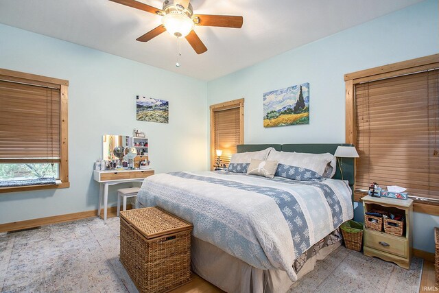 7185 N 1150 W, Shipshewana, IN 46565 - bedroom featuring baseboards and a ceiling fan