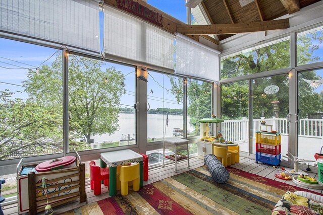 7185 N 1150 W, Shipshewana, IN 46565 - sunroom with a high ceiling, a water view, plenty of natural light, beamed ceiling, and floor to ceiling windows