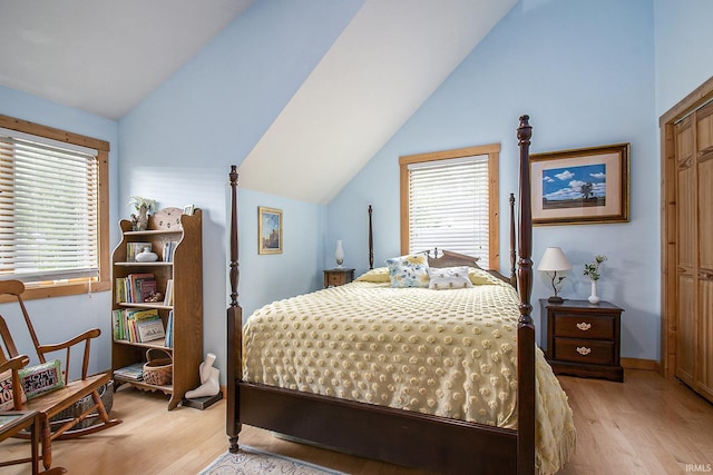 7185 N 1150 W, Shipshewana, IN 46565 - bedroom featuring vaulted ceiling and light wood finished floors