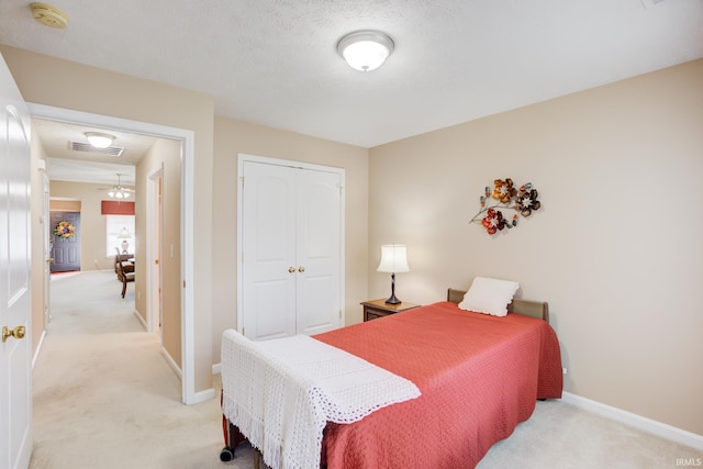 3033 Tory Ct, Evansville, IN 47715 - bedroom with light colored carpet, a closet, and baseboards