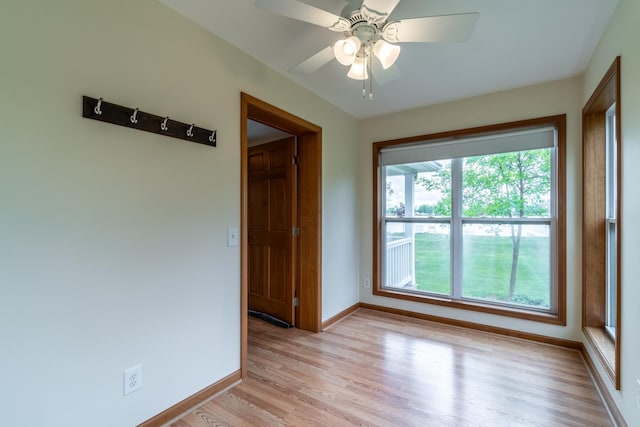 3775 W Columbia St, Columbia City, IN 46725 - empty room with baseboards, light wood-type flooring, and ceiling fan