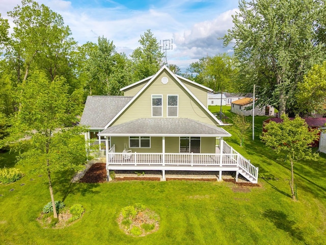 3775 W Columbia St, Columbia City, IN 46725 - rear view of house with covered porch, a lawn, and roof with shingles