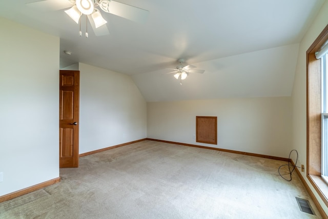 3775 W Columbia St, Columbia City, IN 46725 - bonus room with ceiling fan, light colored carpet, lofted ceiling, baseboards, and plenty of natural light