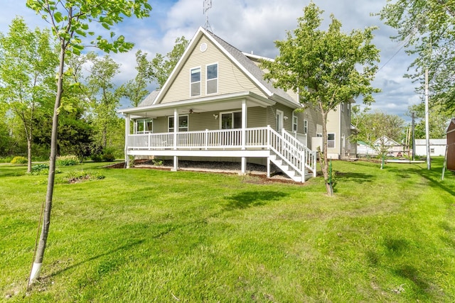 3775 W Columbia St, Columbia City, IN 46725 - rear view of property with a yard, a porch, and ceiling fan
