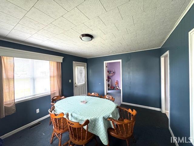 1505 S 3rd St, Clinton, IN 47842 - dining space with baseboards