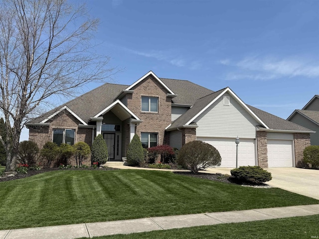 10123 Consta Verde Commons, Leo, IN 46765 - view of front facade with brick siding, a garage, a front yard, concrete driveway, and roof with shingles