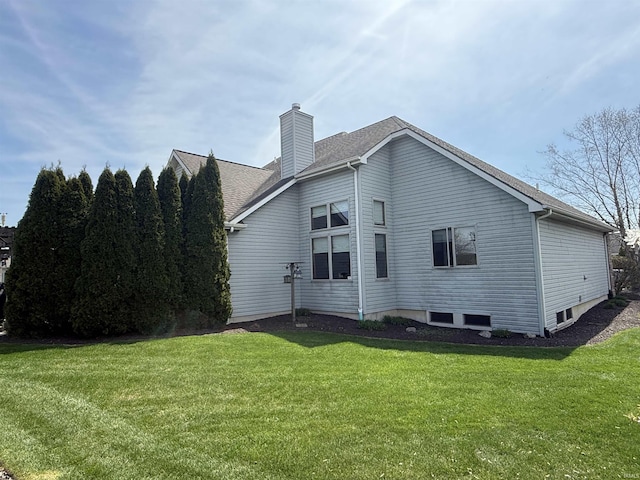 10123 Consta Verde Commons, Leo, IN 46765 - back of property with a chimney and a lawn