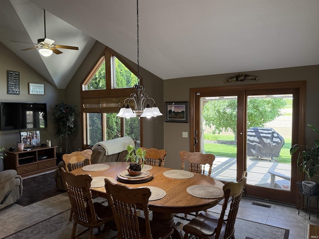 10123 Consta Verde Commons, Leo, IN 46765 - dining area featuring vaulted ceiling, light tile patterned floors, a ceiling fan, and a chandelier