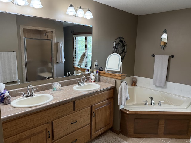 10123 Consta Verde Commons, Leo, IN 46765 - bathroom featuring a shower stall, double vanity, a garden tub, and tile patterned floors