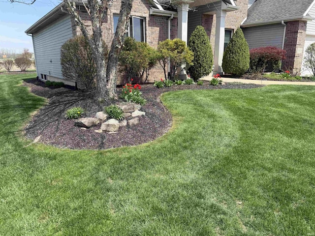 10123 Consta Verde Commons, Leo, IN 46765 - view of home's exterior featuring a yard
