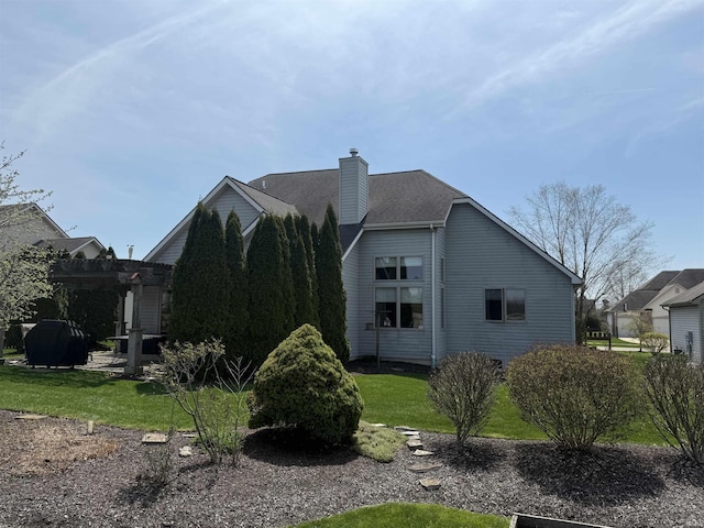 10123 Consta Verde Commons, Leo, IN 46765 - view of property exterior with a pergola, a chimney, and a yard
