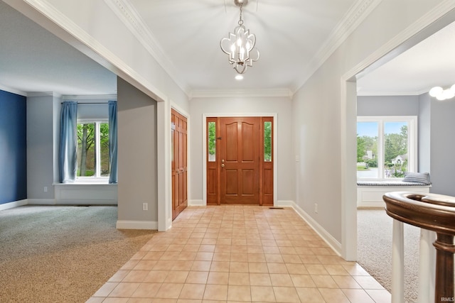 2814 Meadow Strm, Fort Wayne, IN 46825 - entrance foyer featuring a chandelier, plenty of natural light, light colored carpet, baseboards, and ornamental molding