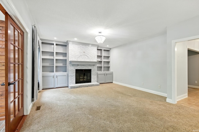 2814 Meadow Strm, Fort Wayne, IN 46825 - unfurnished living room with carpet, baseboards, a brick fireplace, and recessed lighting
