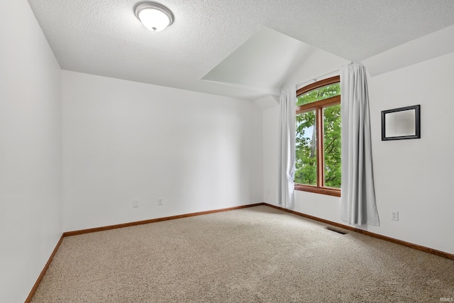 2814 Meadow Strm, Fort Wayne, IN 46825 - bonus room featuring carpet flooring, a textured ceiling, and baseboards