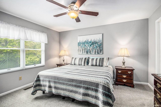 54453 Sagewood Dr, Mishawaka, IN 46545 - bedroom featuring carpet, baseboards, and a ceiling fan