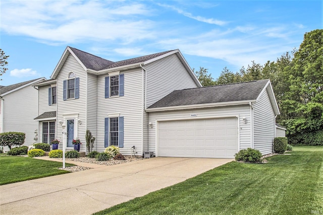 54453 Sagewood Dr, Mishawaka, IN 46545 - view of front of home with an attached garage, concrete driveway, a front yard, and a shingled roof