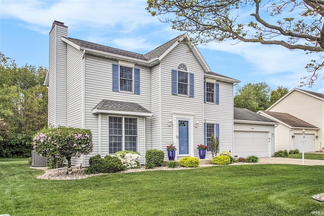 54453 Sagewood Dr, Mishawaka, IN 46545 - traditional-style house featuring a chimney, an attached garage, concrete driveway, and a front lawn