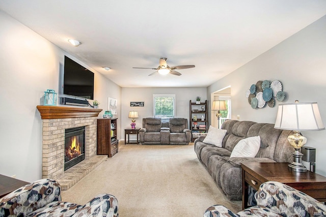 54453 Sagewood Dr, Mishawaka, IN 46545 - living room featuring light colored carpet, a ceiling fan, and a fireplace