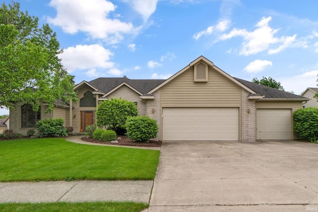 2519 Knightsbridge Dr, Fort Wayne, IN 46815 - view of front of house featuring a garage, brick siding, driveway, and a front yard