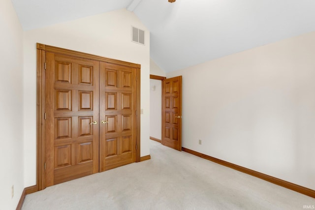 2519 Knightsbridge Dr, Fort Wayne, IN 46815 - unfurnished bedroom featuring lofted ceiling, carpet, and baseboards