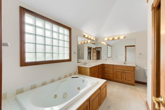 2519 Knightsbridge Dr, Fort Wayne, IN 46815 - full bath with a whirlpool tub, double vanity, toilet, and vaulted ceiling