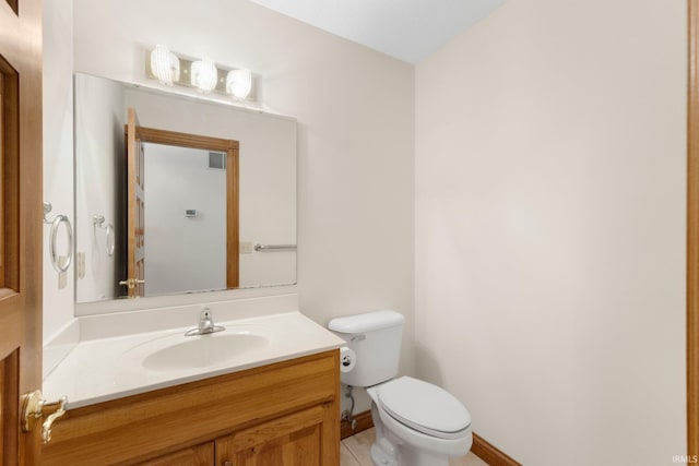 2519 Knightsbridge Dr, Fort Wayne, IN 46815 - bathroom with vanity, toilet, and tile patterned floors