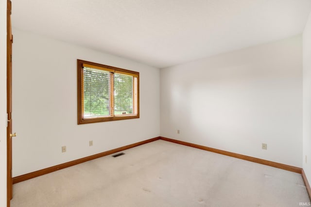 2519 Knightsbridge Dr, Fort Wayne, IN 46815 - unfurnished room featuring light carpet and baseboards
