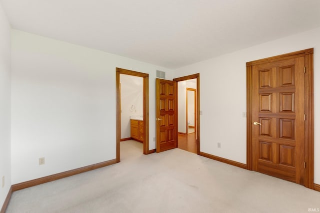 2519 Knightsbridge Dr, Fort Wayne, IN 46815 - unfurnished bedroom featuring baseboards and light carpet