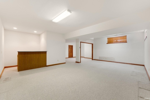 2519 Knightsbridge Dr, Fort Wayne, IN 46815 - finished basement featuring light colored carpet, baseboards, bar area, and recessed lighting