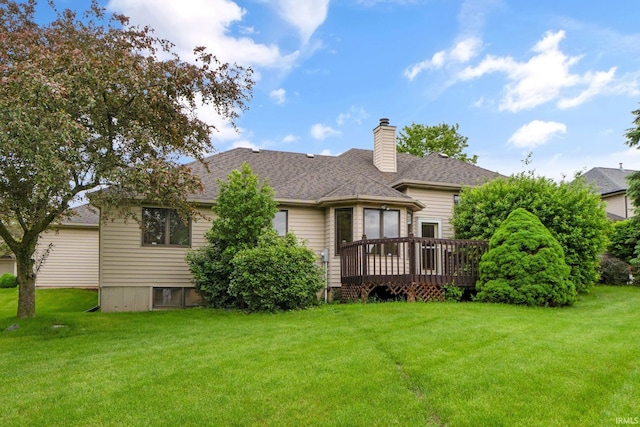 2519 Knightsbridge Dr, Fort Wayne, IN 46815 - rear view of property with a deck, a lawn, a chimney, and a shingled roof