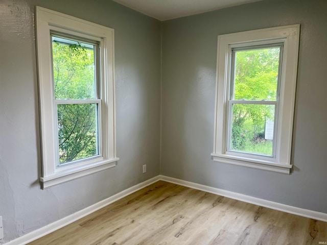 626 S 24th St, South Bend, IN 46615 - spare room with light wood-style flooring and baseboards
