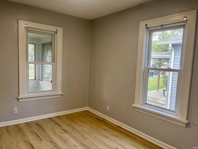 626 S 24th St, South Bend, IN 46615 - unfurnished room with baseboards and wood finished floors
