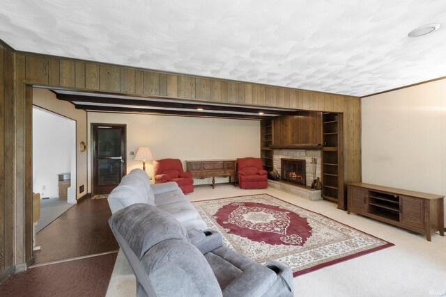 213 S Clark St, Auburn, IN 46706 - living room with wooden walls, built in features, and a fireplace