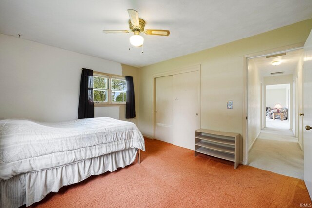 213 S Clark St, Auburn, IN 46706 - bedroom featuring carpet flooring, a closet, and a ceiling fan