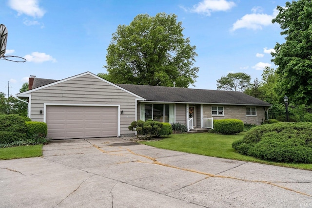 213 S Clark St, Auburn, IN 46706 - single story home with an attached garage, concrete driveway, a front lawn, and a shingled roof