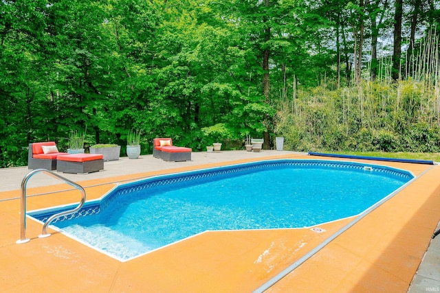 4691 E Inverness Woods Rd, Bloomington, IN 47401 - view of swimming pool featuring a patio area and a covered pool