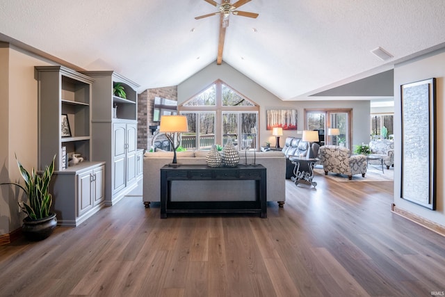 2525 Ladue Cv, Fort Wayne, IN 46804 - living area featuring wood finished floors, a ceiling fan, and a textured ceiling