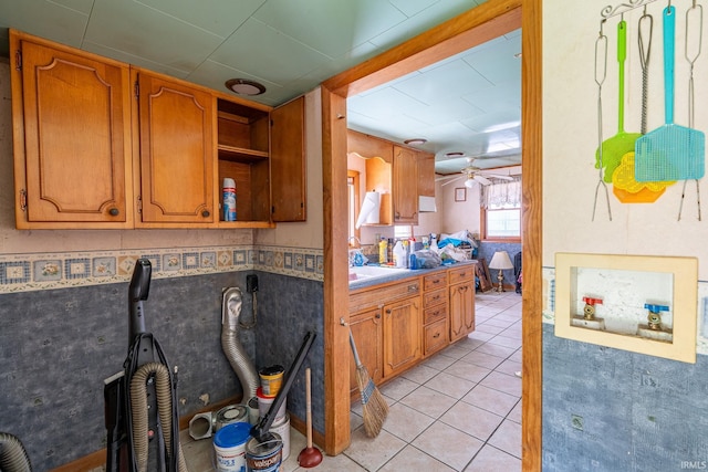 139 Elm St, Wabash, IN 46992 - kitchen featuring light tile patterned floors, a ceiling fan, brown cabinets, and open shelves