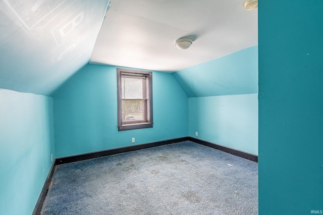 139 Elm St, Wabash, IN 46992 - additional living space featuring carpet, lofted ceiling, and baseboards