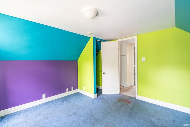 139 Elm St, Wabash, IN 46992 - additional living space featuring vaulted ceiling, baseboards, and carpet