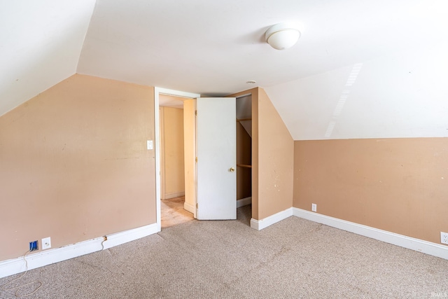 139 Elm St, Wabash, IN 46992 - additional living space with carpet, vaulted ceiling, and baseboards
