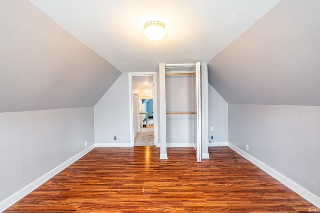 139 Elm St, Wabash, IN 46992 - additional living space featuring wood finished floors, baseboards, and lofted ceiling
