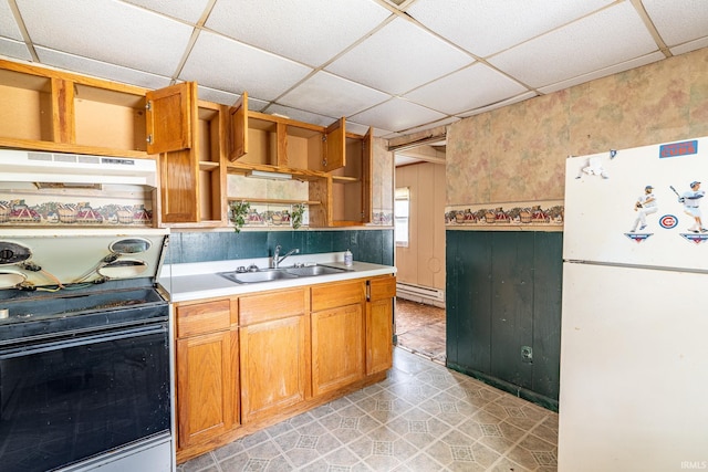 139 Elm St, Wabash, IN 46992 - kitchen with freestanding refrigerator, open shelves, a sink, under cabinet range hood, and baseboard heating