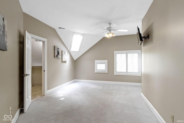 10919 Running Tide Ct, Indianapolis, IN 46236 - additional living space featuring carpet, a ceiling fan, lofted ceiling, and baseboards