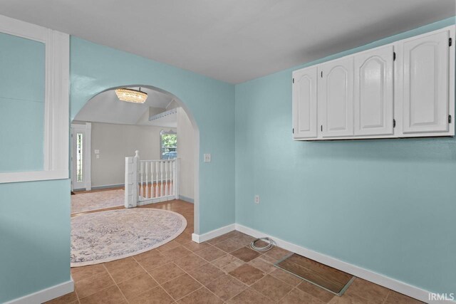 2545 N Bell St, Kokomo, IN 46901 - unfurnished room with arched walkways and baseboards