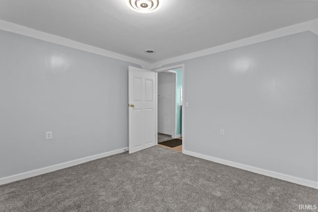 2545 N Bell St, Kokomo, IN 46901 - carpeted empty room featuring baseboards
