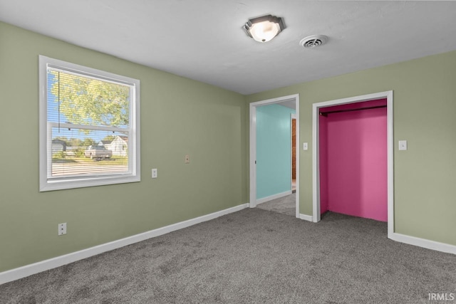 2545 N Bell St, Kokomo, IN 46901 - unfurnished bedroom featuring carpet, baseboards, and a closet