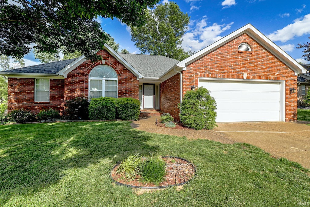 3766 Canterbury Ct, Newburgh, IN 47630 - ranch-style home with brick siding, concrete driveway, a garage, and a front yard