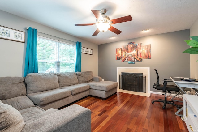 687 N Deer Lake Dr, Bloomfield, IN 47424 - living area featuring a fireplace, a ceiling fan, dark wood finished floors, and recessed lighting
