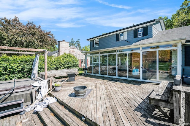 23337 Shorelane, Elkhart, IN 46514 - wooden deck with a sunroom and a hot tub